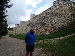 Beside the castle walls.